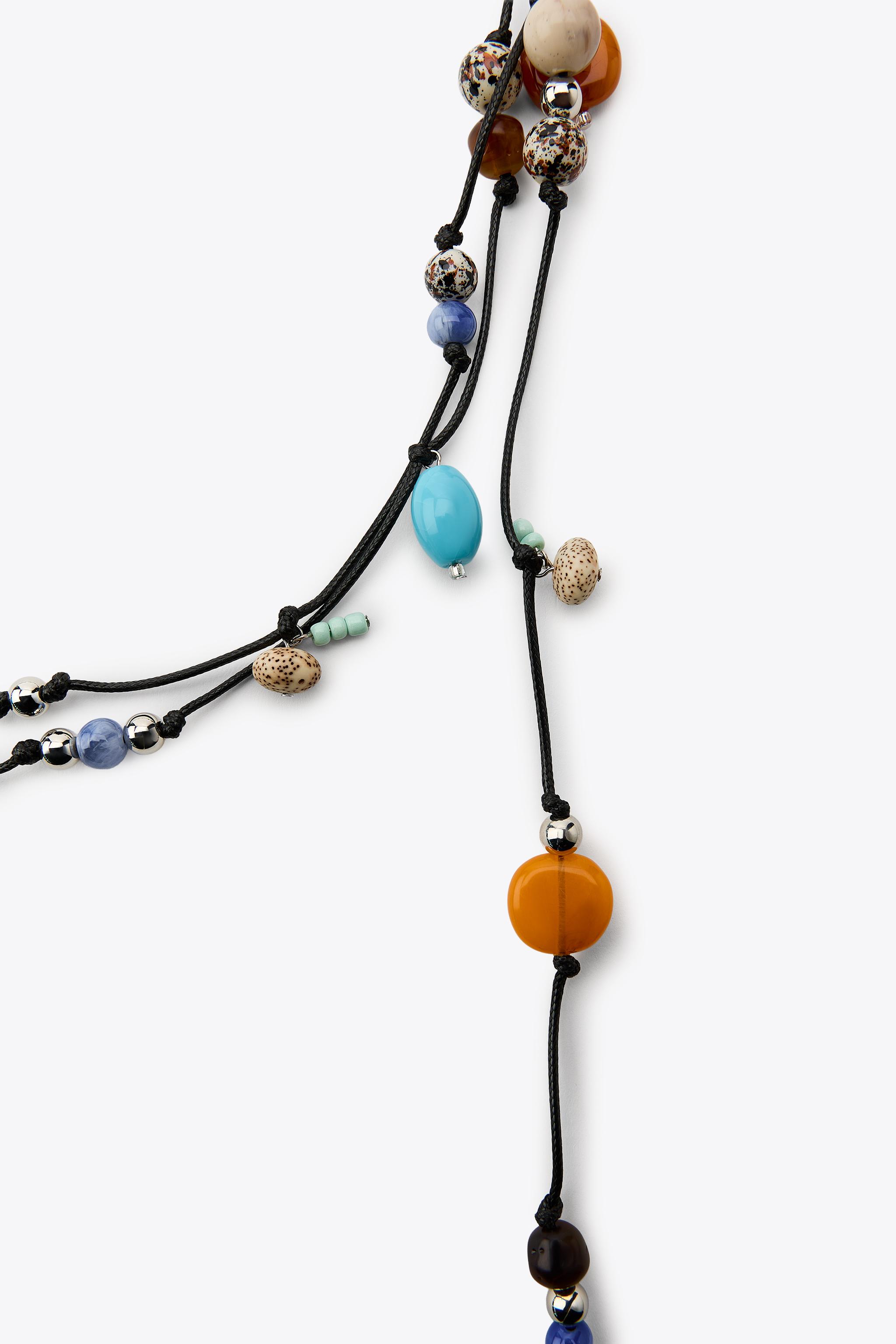 MULTI-POSITION BEAD CORD NECKLACE
